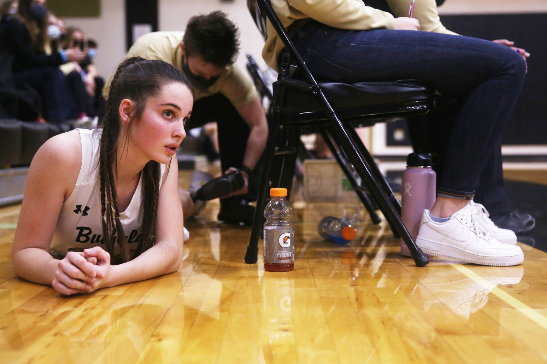 Cassidy Bessler stretches her head around to watch the ball